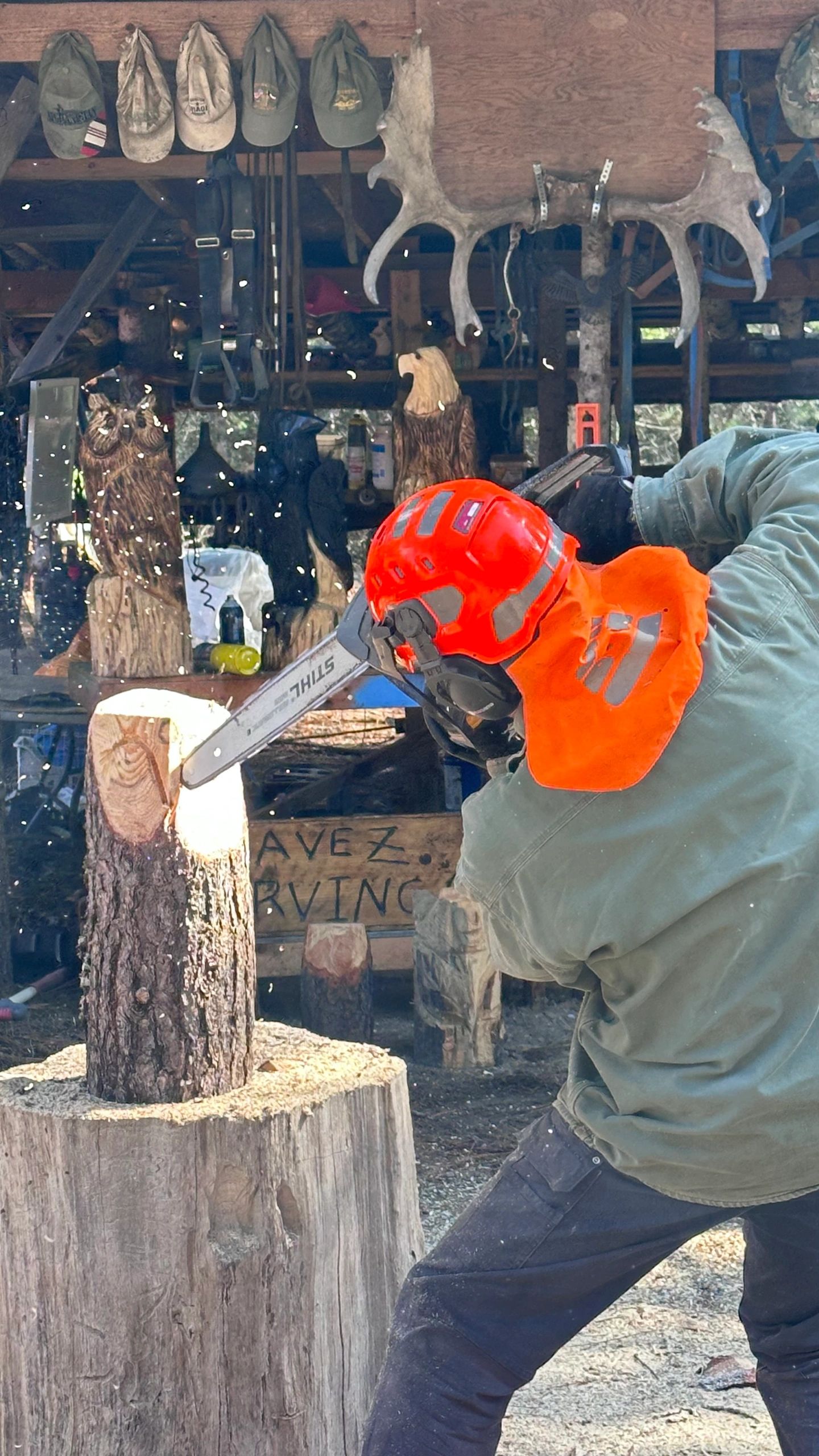 Carving retreat group displaying their finished work